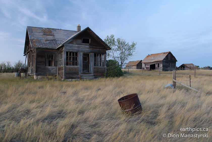In the early pioneer days, people had to clear the trees off the land using an axe and a pick.  Sometimes it would take a hard day's work to remove the root system from only one or two trees.  If the farmer had a horse or an ox, they would be used to help pull the tree down. Tony Kutcher Dauphin, Manitoba People dug wells for water with a spade.  Ours was about 12 feet deep.  When digging a well, wood walls were built as "cribbing" to support the dirt and gravel so it wouldn't cave in.  The gravel and dirt was pulled out with a bucket on a rope, a half bucket at a time. Joe Kizlyk Fosston, Saskatchewan